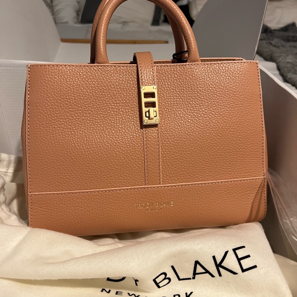 Small Teddy Blake had bag, brand new in box never used.